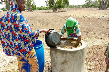 A woman and man at a food well