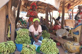 Woman in a banana stall