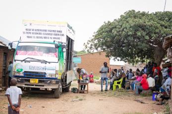 People standing near a truck
