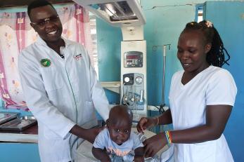Doctor with child and woman