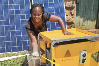 woman with a solar mill