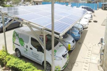 electric trucks under solar panel