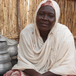 Woman sitting near pots