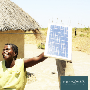 Woman holding a solar panel