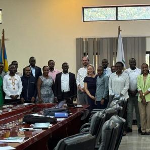 Group of people standing in conference room