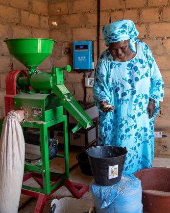 woman filling pot