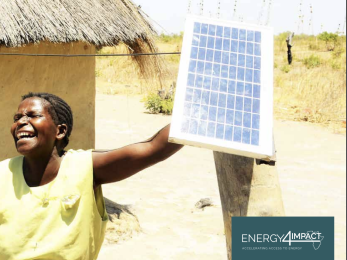Woman holding a solar panel