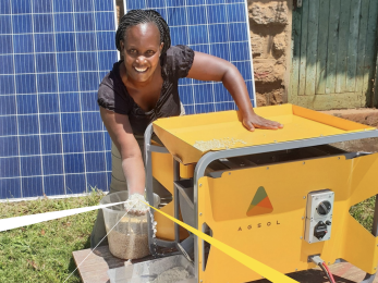 Woman with a solar mill