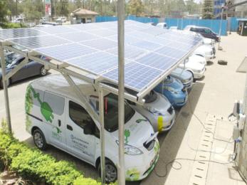 Electric trucks under solar panel